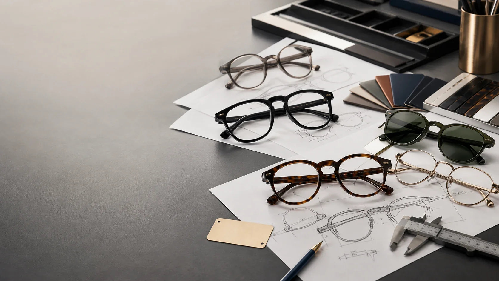 OEM and ODM eyewear design workspace with frames, sunglasses and production tools