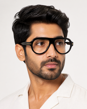 Male model wearing OS26 LH299 black aviator sheet eyewear with clear white lenses
